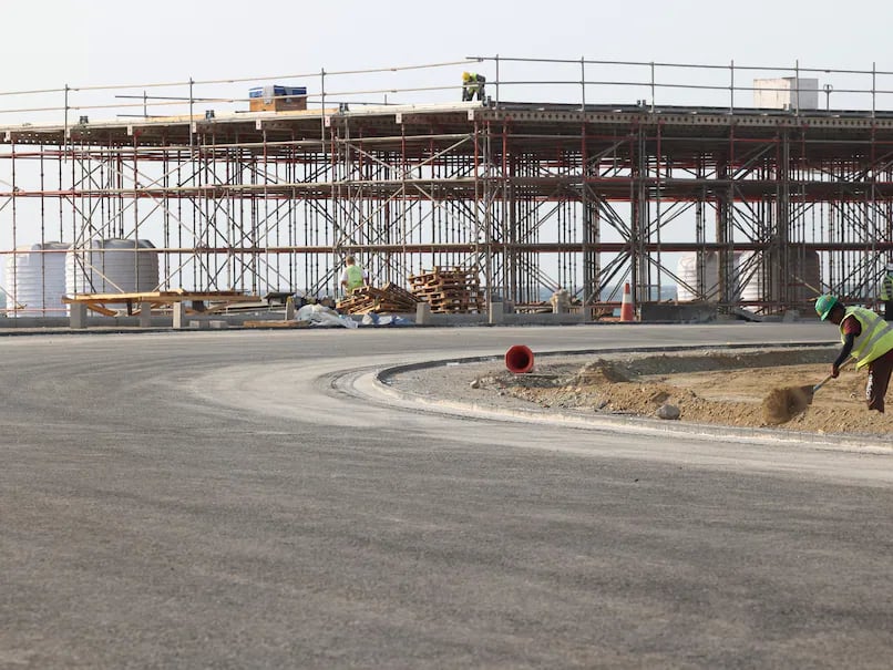 a person walking across a bridge