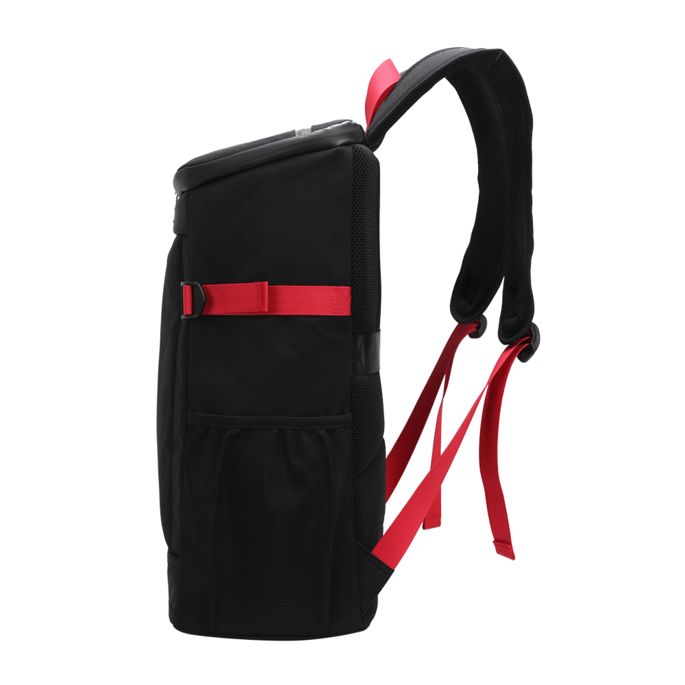 sac à dos isotherme noir avec des bretelles rouges, conçu pour garder les aliments et boissons au frais, idéal pour les pique-niques et les sorties en plein air.