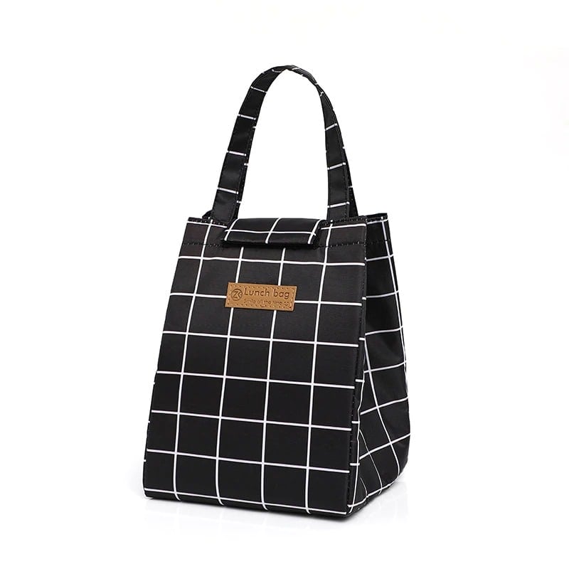 Sac isotherme noir à motifs carreaux blancs, idéal pour transporter des repas et garder les aliments au frais.