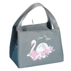 Sac isotherme en toile grise avec motif de cygne et fleurs, idéal pour transporter des repas et des boissons tout en maintenant leur température.