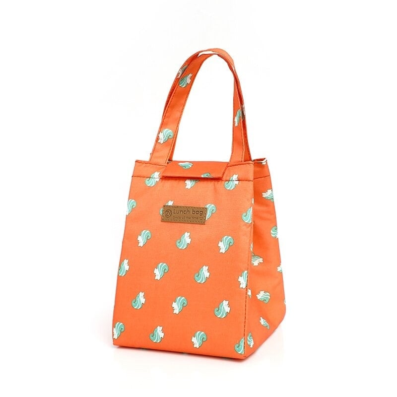 sac isotherme orange avec motif de feuilles, idéal pour transporter des repas et des collations, doté de poignées pour un transport facile
