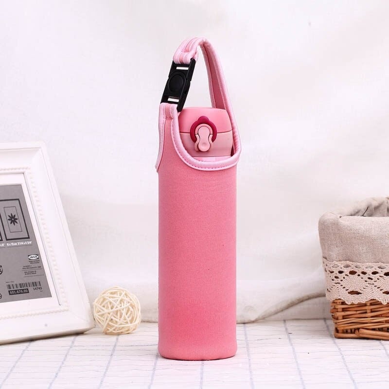 sac isotherme rose avec poignée pour bouteille, conçu pour maintenir la température des boissons, idéal pour les activités en extérieur et les déplacements.