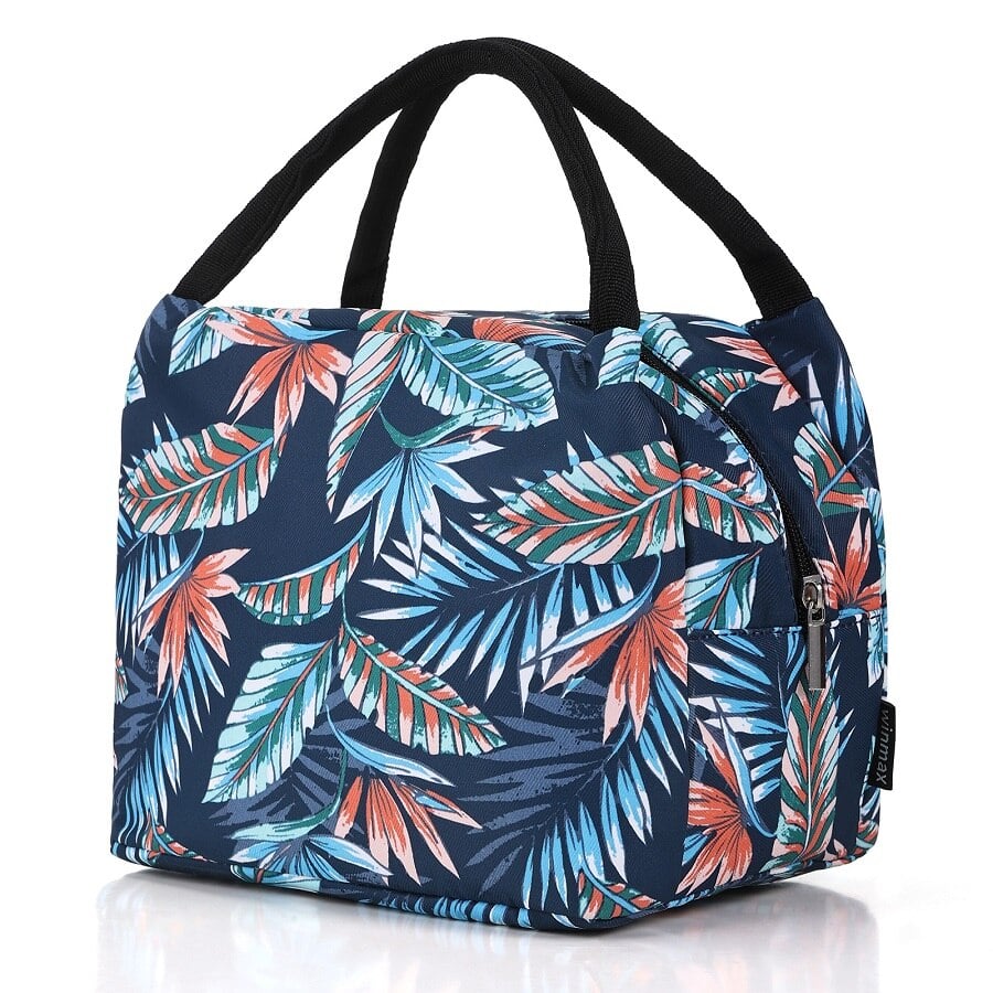 Sac isotherme avec motif tropical, idéal pour conserver les aliments et boissons au frais, doté de poignées noires pour un transport facile.