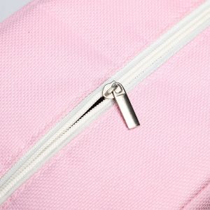 Sac isotherme rose avec fermeture éclair, conçu pour maintenir la température des aliments et des boissons.