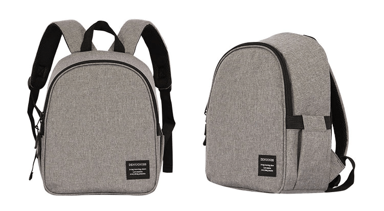 sacs à dos isothermes en tissu gris, conçus pour garder les aliments et boissons au frais, avec des bretelles réglables et un design moderne.