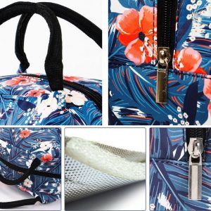 Sac isotherme à motifs floraux avec fermeture éclair, conçu pour garder les aliments et boissons au frais, doté de poignées robustes pour un transport facile.