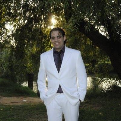 a man in a white suit