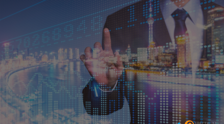 A businessman in a suit interacting with a digital financial interface, representing innovative payment processing solutions like dual pricing with Spectrum Payment Solutions.