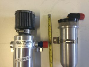 vent fitting is highest point, 4" higher and above 3 micron Spintric designed / manufactured air filter allowing the line to slope downwards towards dry sump tank