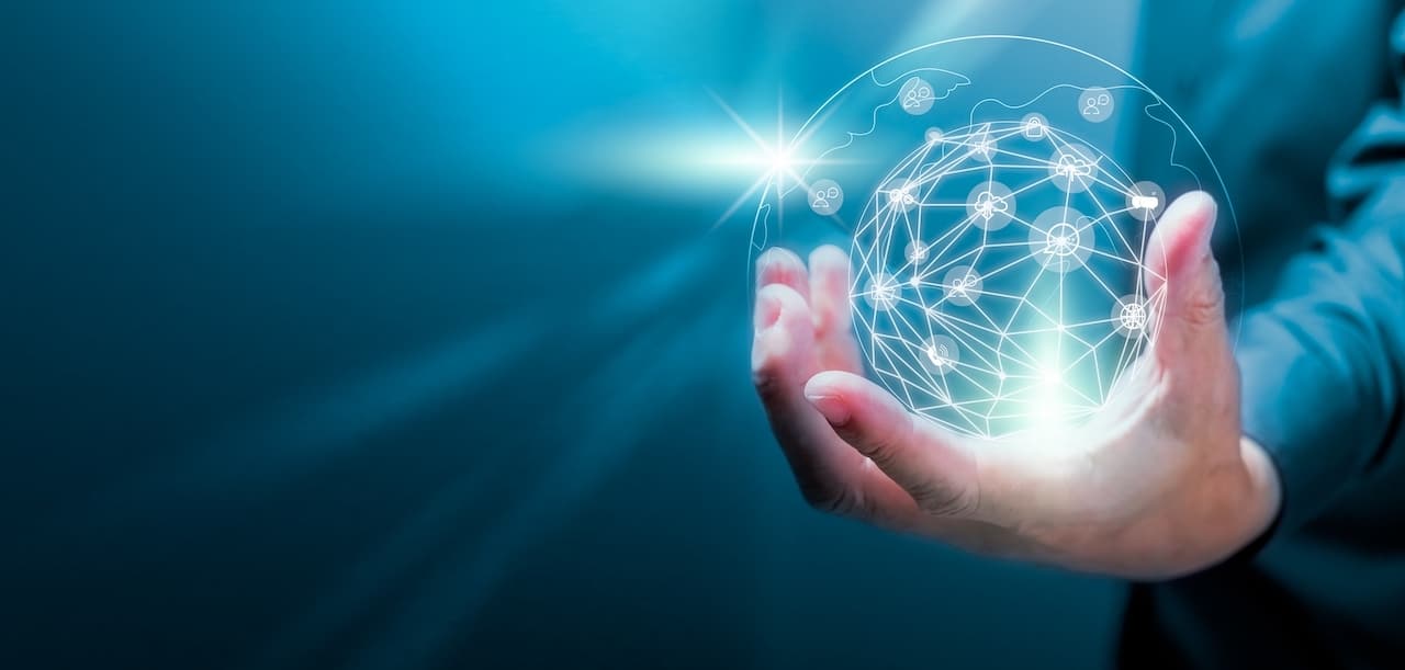 A businessman's hand securely holding a networked globe, representing efficient network security solutions.