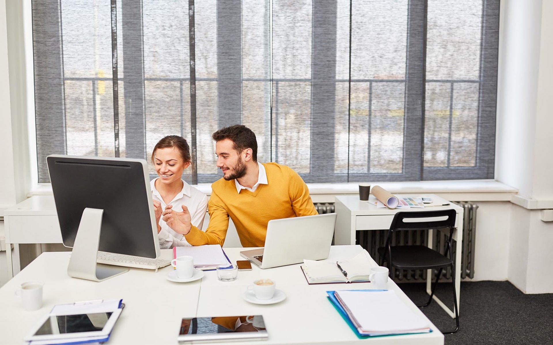 Stability Networks Blog IT consulting man helping woman