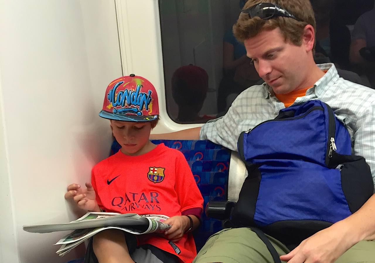 rory-moulton-tube-london-newspaper