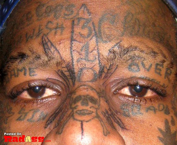 A man with permanent face tattoos.