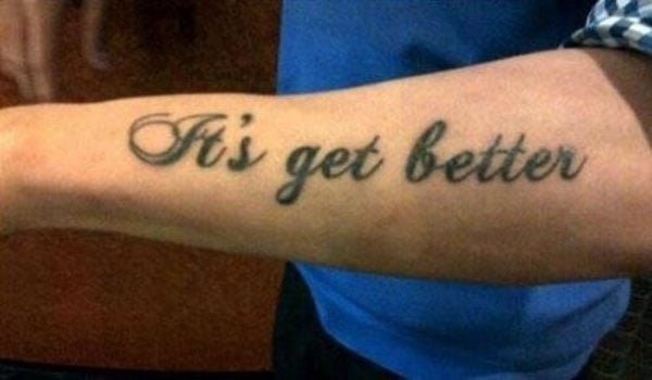 A person with a tattoo that says