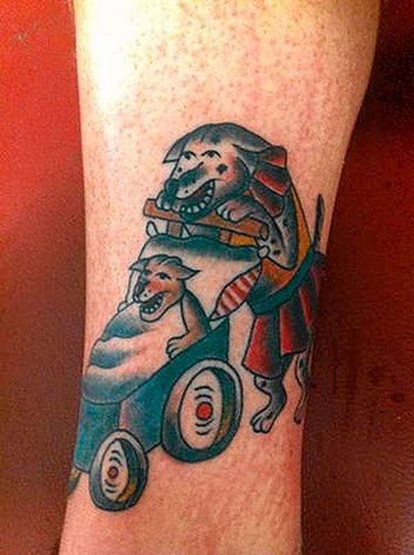 A tattoo of a dog riding in a car to make you feel better about your life.