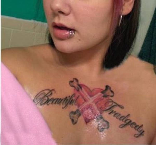 A woman with a heart tattoo on her chest featured in an article titled