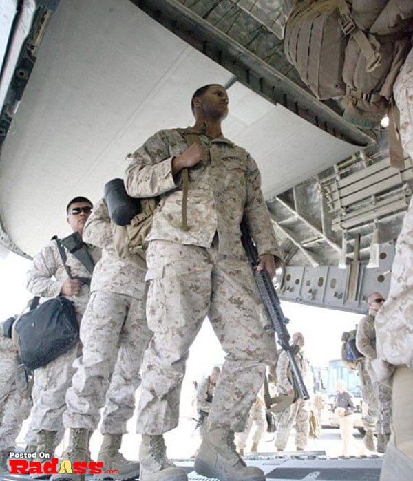 American heroes walking out of a plane in an inspiring display of bravery and gratitude.