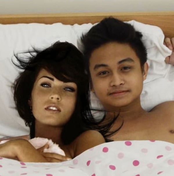 A man and a woman showcasing the guy's killer Photoshop skills.