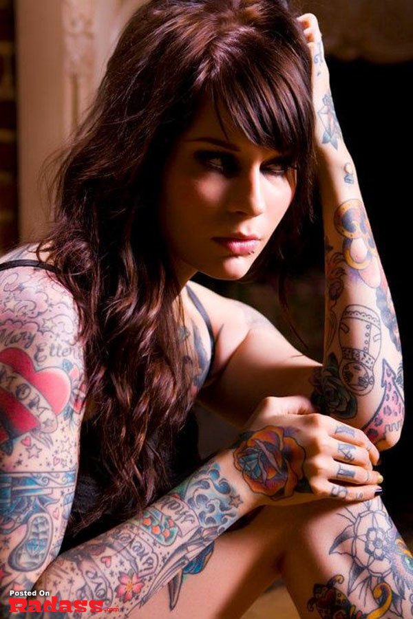 hot girls with tattoos-22 A man showcasing an incredible tattoo featuring a guitar on his back, by Benjamin Blaukis.