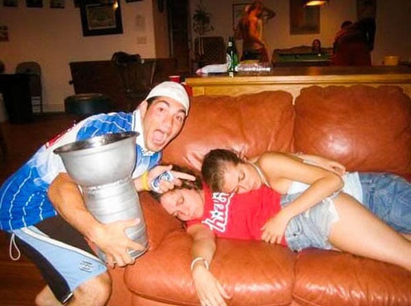 So The Girls Got A Bit Wild This Weekend, laying on a couch with a hockey puck.