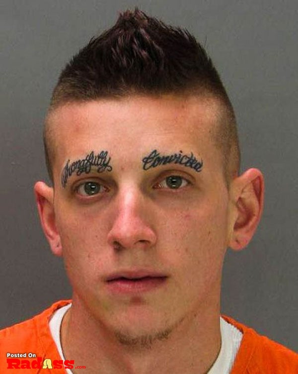 A man with permanent tattoos on his face.