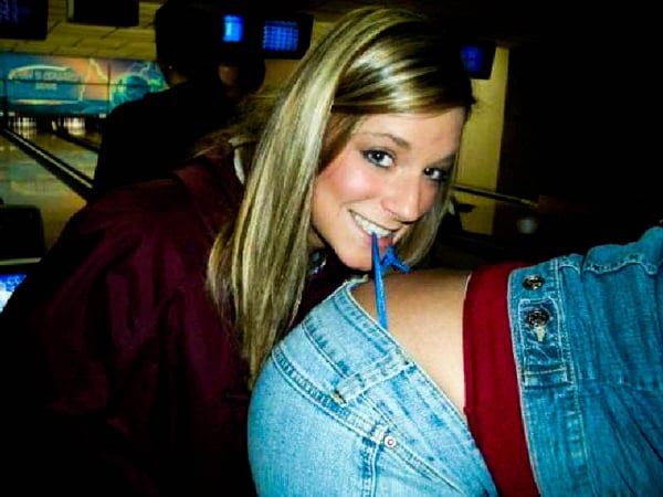 A woman with a hilarious bowling ball surprise.