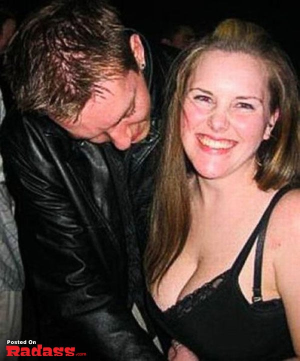 A man and a woman posing for a picture.