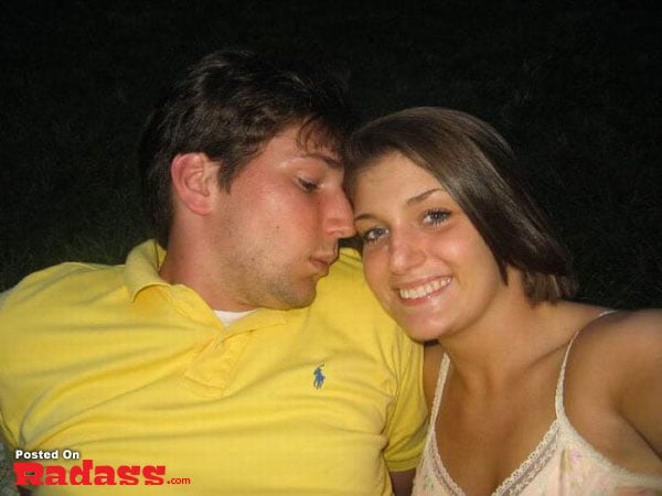 A man and a woman posing for a picture, capturing a moment.
