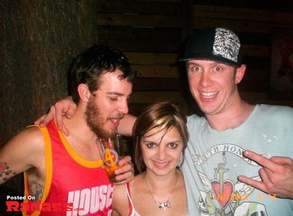 Three people posing for a picture at a party - Did you see that pose?