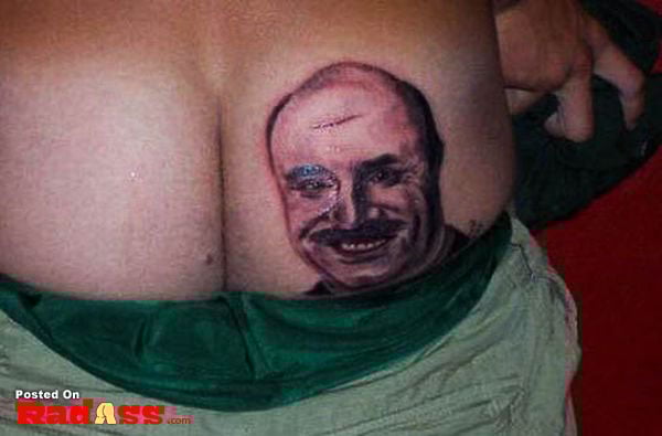 Man, tattooed, moustache.