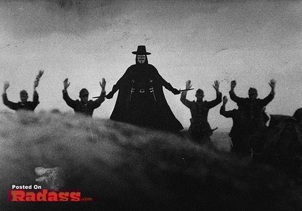 Super Heroes Throughout History: A black and white photo of a man in a cloak, one of 12 pics.