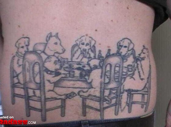 A man's regrettable tattoo of a group of dogs at a table.