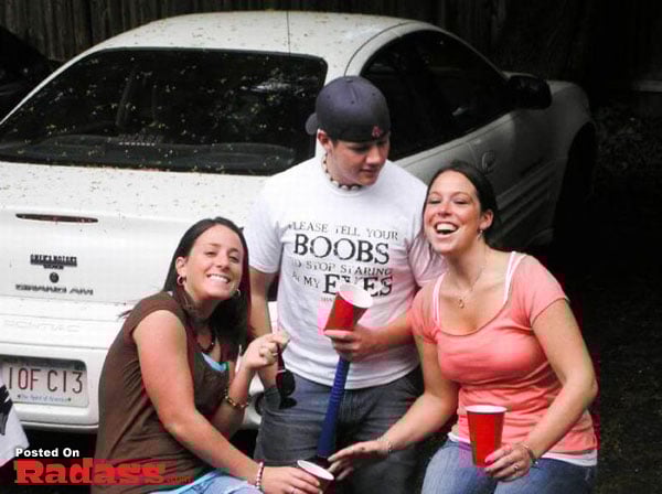 A group of people standing in front of a car, Did You See That?