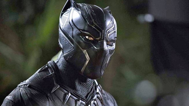A black panther, a symbol of the Black Panther Legacy, stands stoically in front of a lush tree in Wakanda, showcasing why this hidden kingdom is truly forever.