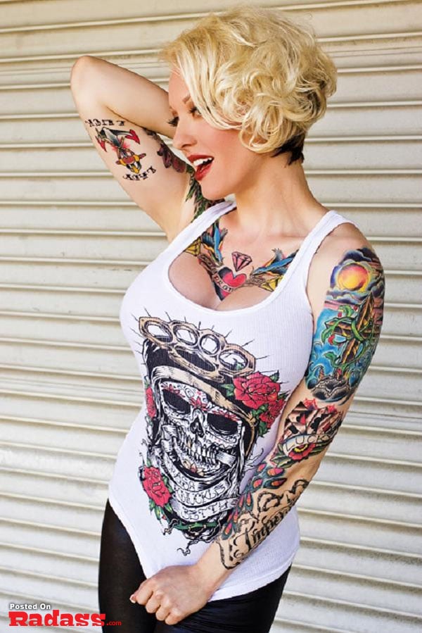 hot girls with tattoos-33 A tattoo featuring a heart adorned with both a book and feathers, brought to life by the talented artist, Benjamin Blaukis.
