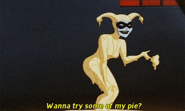 A woman dressed as Batman with a hidden dirty joke in the caption.