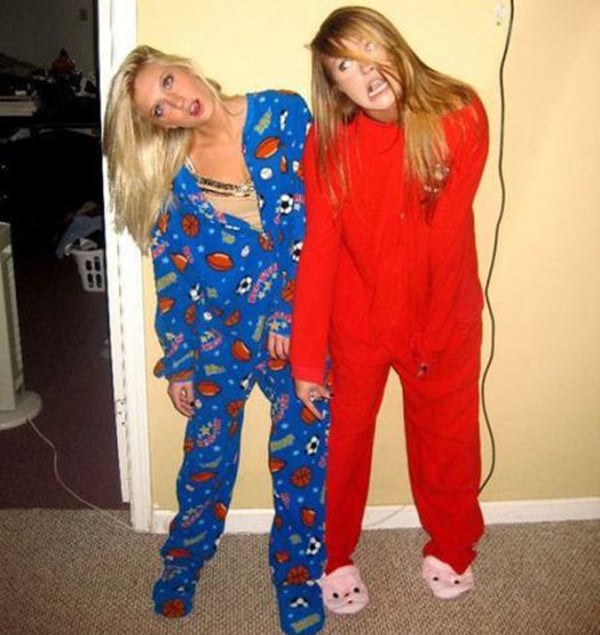 Two girls in red pajamas posing for a picture, but I Would Date You But...