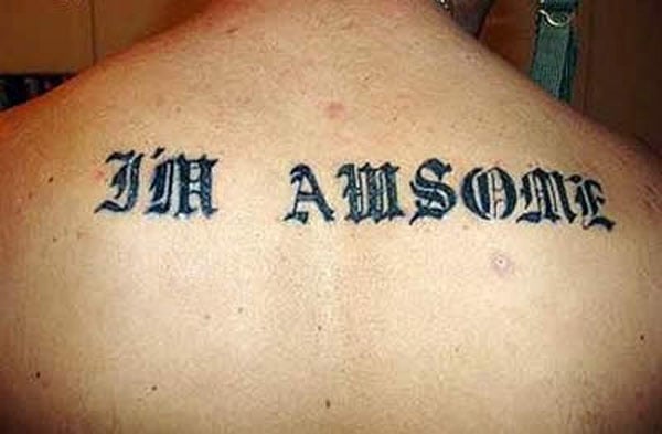 A man adorned with a tattoo to uplift your spirit.