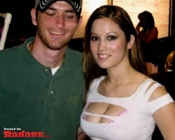 A man and a woman posing for a picture demonstrate widespread popularity.