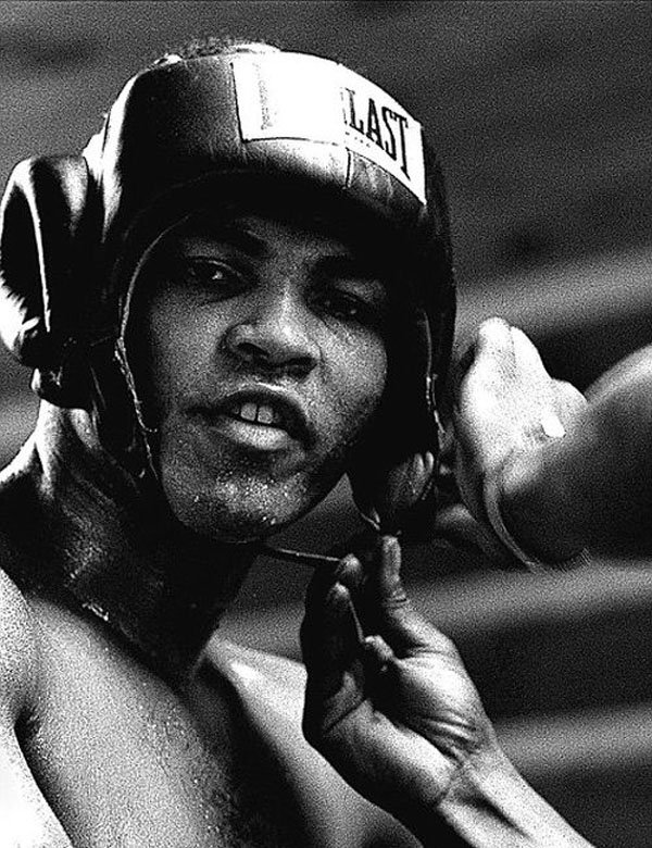 Rare black and white photo of Muhammad Ali training in a boxing ring for