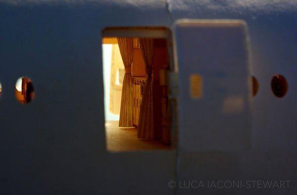 Luca Iaconi-Stewart's mind-blowing model airplane with a light shining through its doorway.