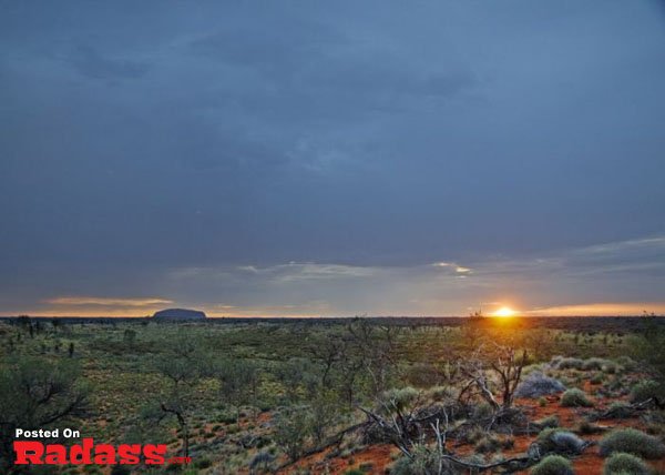 The sun is setting over Uluru in the Australian outback, get ready to keep your Calgon!
