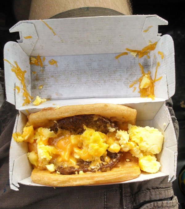 A hot dog, one of the 16 meals every college student needs to survive, served in a box.