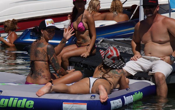 A group of people on an inflatable raft enjoying a fun outing.