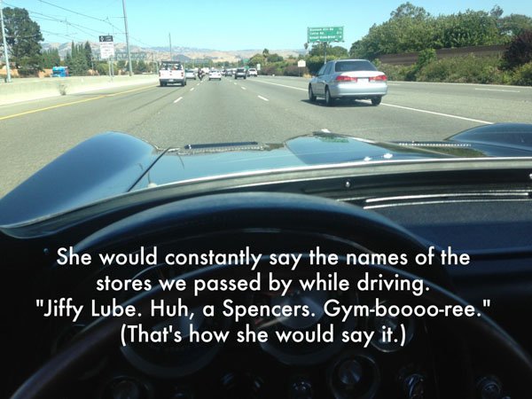 A car driving down the road with a hilarious quote on it.