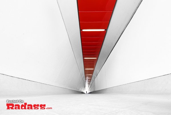 A collection of beautiful, high-quality architecture photographs showcasing a stunning white and red tunnel with a bold red stripe.