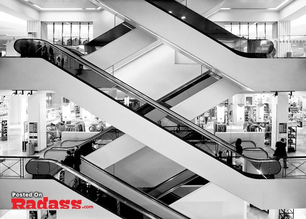architecture-10 A stunning black and white photograph capturing the beauty of the architecture in a shopping mall.