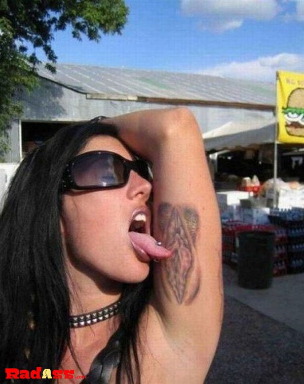 A woman with a tattoo on her arm, embodying the spirit of