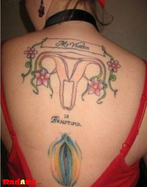 A woman proudly displaying a unique tattoo on her back, showcasing living in the moment.