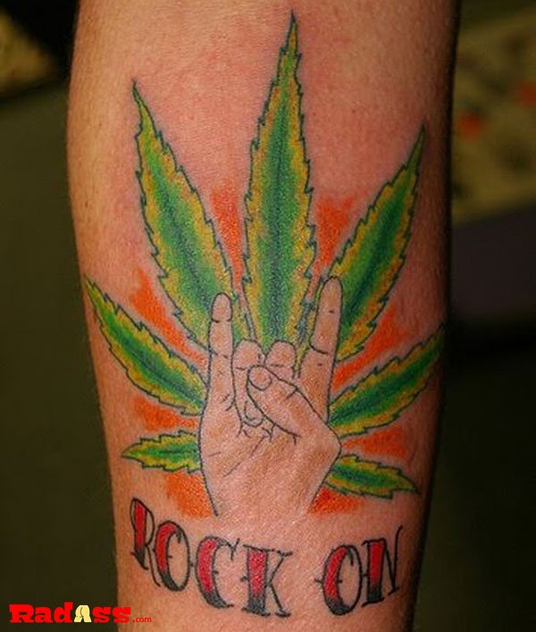 A tattoo of a marijuana leaf with the word